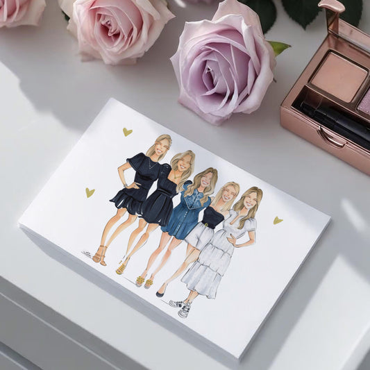 Notebook with illustrations of four women on a surface with pink roses and makeup.