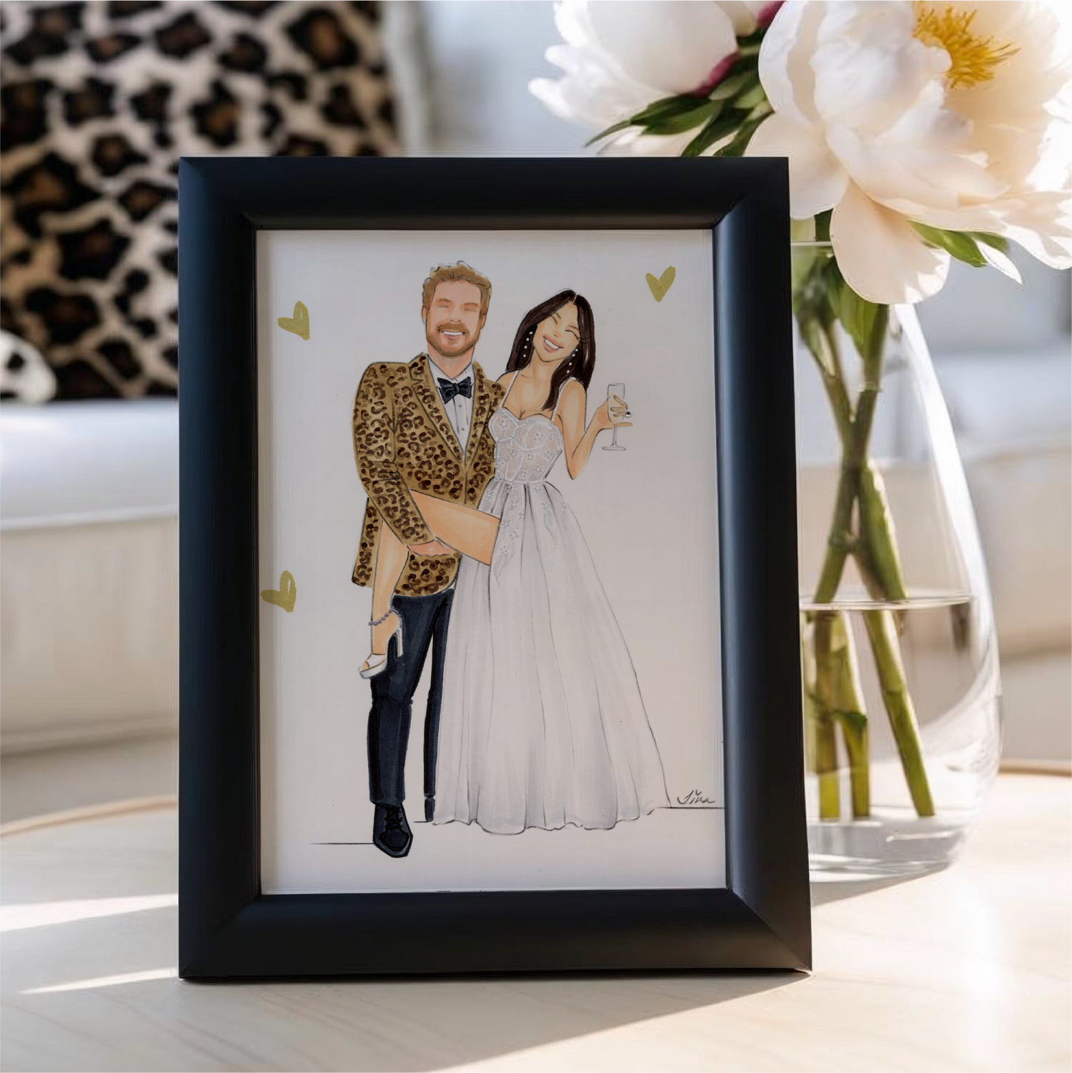 Framed illustration of a couple in formal attire with flowers in the background
