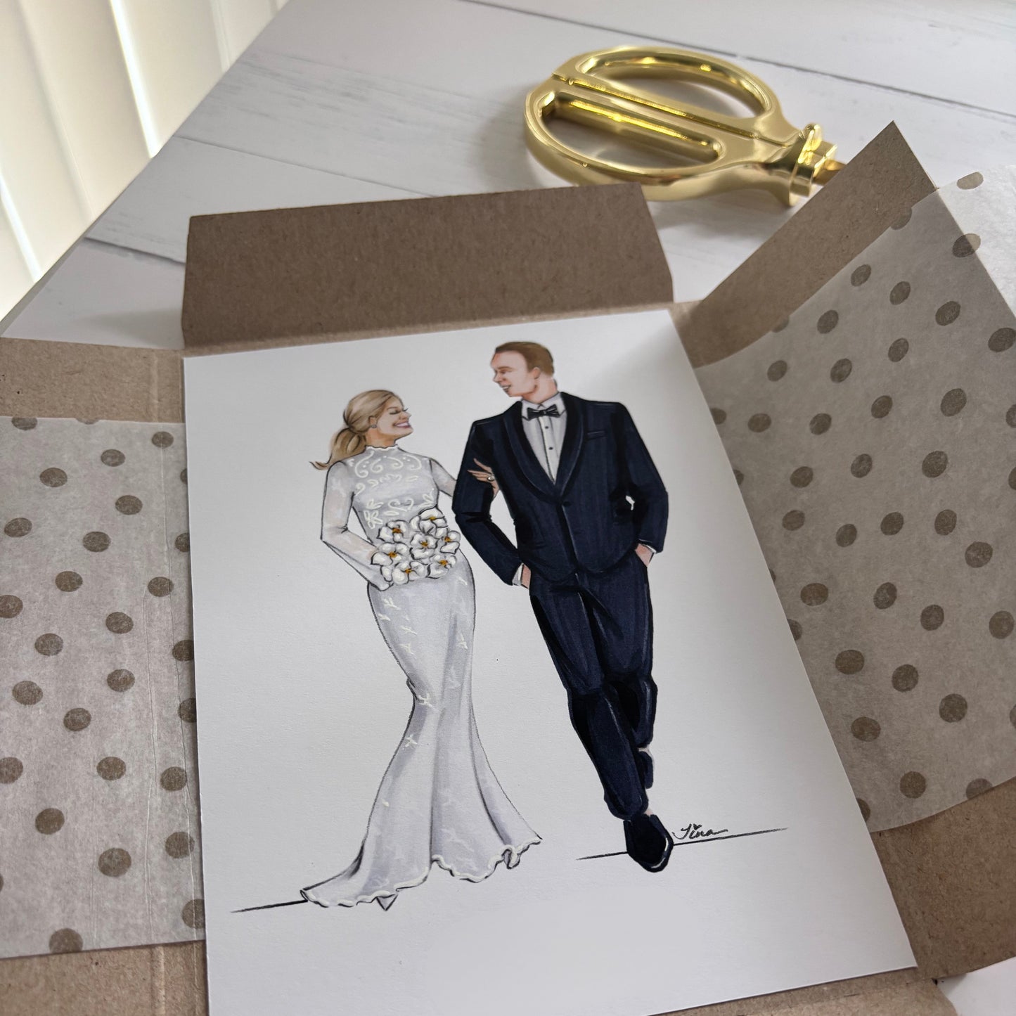 Greeting card with illustrations of a bride and groom on a polka dot tissue paper