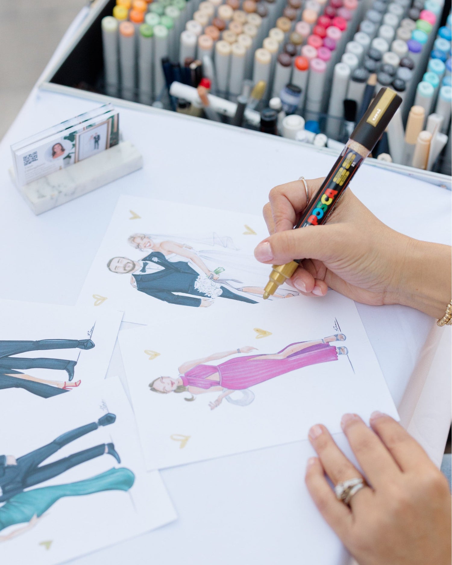 Elegant live sketching station setup for Florida wedding reception